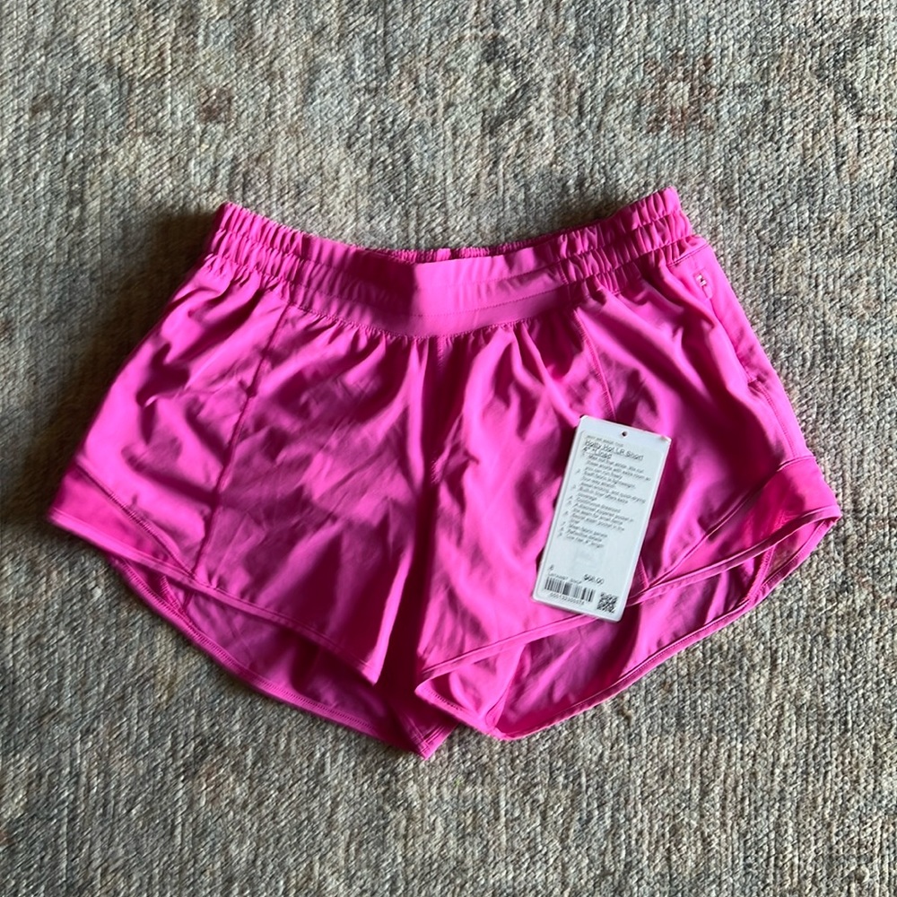 Lululemon low rise Hotty hots size 8. 4” inseam worn 1x. Sonic pink. EUC.